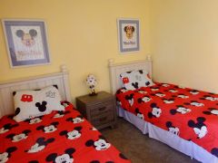 Disney themed, two single beds