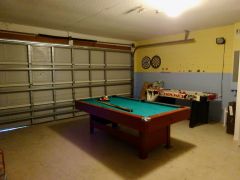 Large games room with Pool Table, Ice Hockey Table and Dart Board. A selection of toys, games and books ideal for adults and children of all ages.