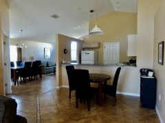 Casual eating area with table and chairs adjacent to the kitchen.
